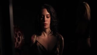 She was blindfolded, hands bound in front of her as she knelt before her lover