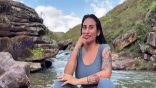 She felt his hard, throbbing cock sliding into her wet pussy as she knelt on the riverbank, her eyes closed in pleasure