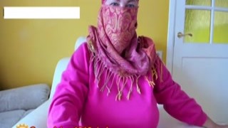 The hot Arabic girl in her tight hijab slowly began to undress, revealing her big tits with erect nipples and her thick, juicy ass