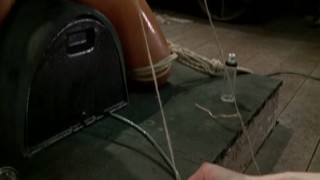 Butt plugged and hogtied lesbian babe