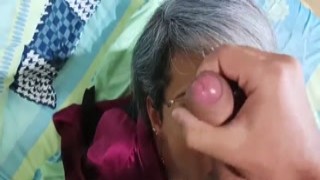 I silently watch as my horny stepmom wanks herself through the closet door, stroking her tits and pussy furiously