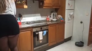 The slutty Latina with the huge ass was bent over the kitchen counter, checking her phone