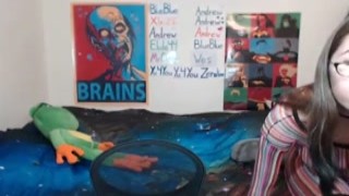 Oh my god! That little slut is playing with her wet pussy like a fucking pro! Shes stroking those clit so hard, I bet shes gonna cum real soon! 

Shes got her legs spread open, showing off that delicious pink snatch