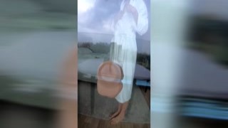 kiss1couple - She gets spit-roasted by a dildo in the window. And got caught by stranger