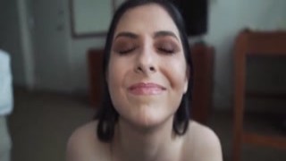 Kaitlyn Katsaros teases the camera by seductively showing off her sensual curves and shapely ass, while also getting her pussy smacked by the cameraman