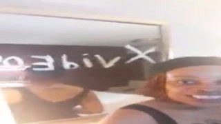 She was sitting on the edge of the bed, her legs spread apart, and her pussy dripping with anticipation