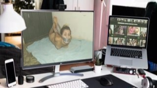 She writhed on the dank, damp floor of the dark basement, her tits bouncing in her tight top as she moaned out for mercy