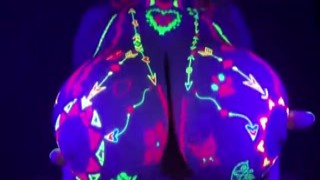  Lily Koti, in all her neon glory, is on all fours, with her ass in the air, waiting for your cock