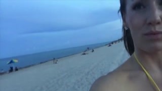 sexy jillian slips into her tiny little gold bikini, feeling the material hugging her luscious body