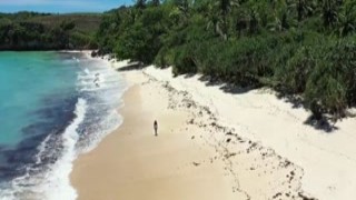 The hot Asian babe, Putri Cinta, lay on her back, her legs spread wide open, her pussy exposed to the ocean breeze as she took it all in