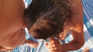 Mrs Robinson - Hotwife gives blowjobs to guys at the beach