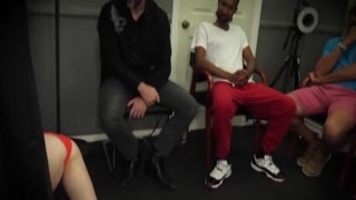 The petite, fiery redhead babe was the center of attention as a group of interracial studs took turns pounding her ass