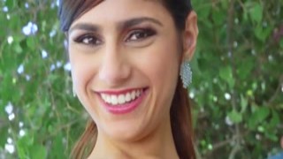 Mia Khalifa, the Arab goddess, was laying on a beach towel next to the pool, her big tits practically bursting out of her bikini top