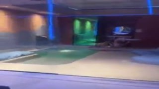 The sexy brunette was standing in front of me, her big tits spilling over the top of her tank top