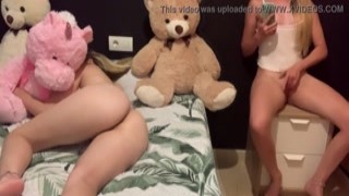 This horny little slut loved to stroke her wet pussy while her stepsister was next to her